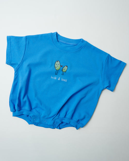 Front view of Little & Loved baby romper in sky blue organic cotton with heart-sharing olives.